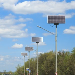 solar-panels-along-a-highway-road-against-a-blue-s-2023-11-27-05-00-56-utc